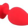 Красная силиконовая анальная пробка с черным стразом-сердечком - 9,3 см. купить в секс шопе