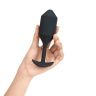 Черная пробка для ношения с вибрацией Snug Plug 4 - 14 см. купить в секс шопе