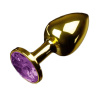 Маленькая золотистая анальная пробка с круглым кончиком и фиолетовым кристаллом - 7 см. купить в секс шопе