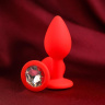 Красная анальная пробка с прозрачным кристаллом - 7,2 см. купить в секс шопе