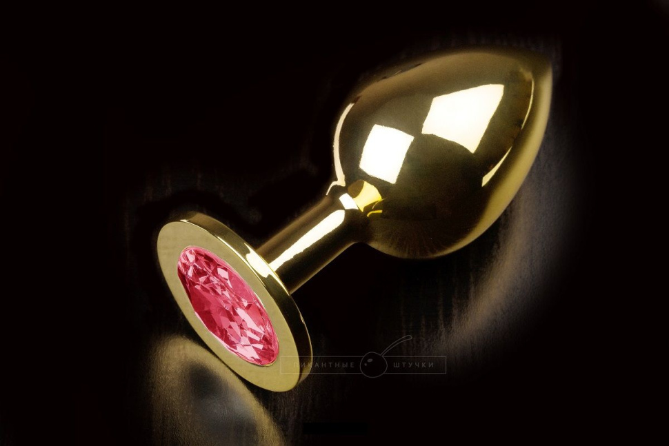 Большая золотая анальная пробка с закругленным кончиком и рубиновым кристаллом - 9 см. купить в секс шопе