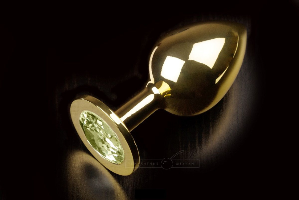 Большая золотая анальная пробка с закругленным кончиком и жёлтым кристаллом - 9 см. купить в секс шопе