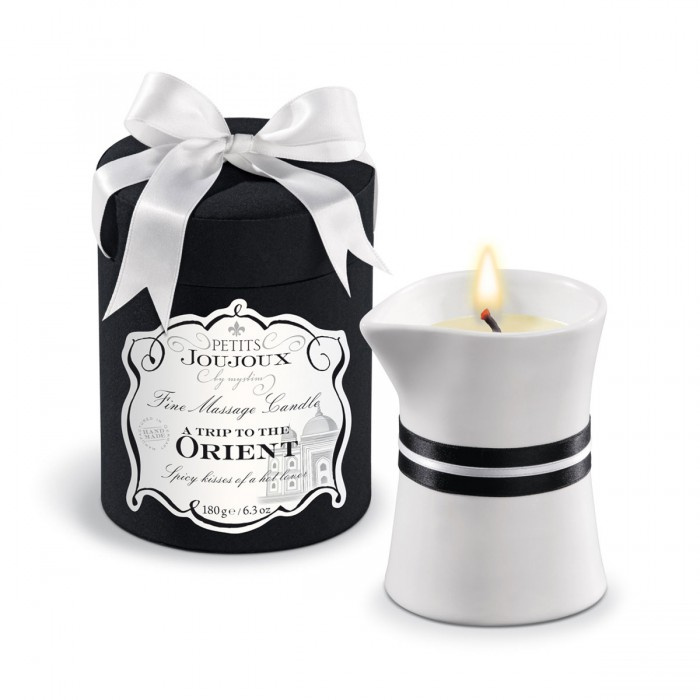 Массажное масло в виде большой свечи Petits Joujoux Orient с ароматом граната и белого перца купить в секс шопе