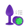 Фиолетовая силиконовая пробка с зеленым кристаллом - 7,3 см.  купить в секс шопе