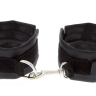 Чёрные полиуретановые наручники с карабином Beginners Wrist Restraints купить в секс шопе