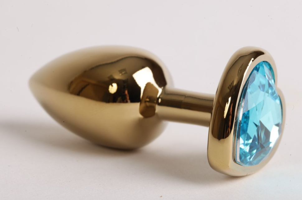 Золотистая анальная пробка с голубым стразиком-сердечком - 7,5 см. купить в секс шопе