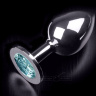 Большая серебристая анальная пробка с круглым кончиком и ярким голубым кристаллом - 9 см. купить в секс шопе