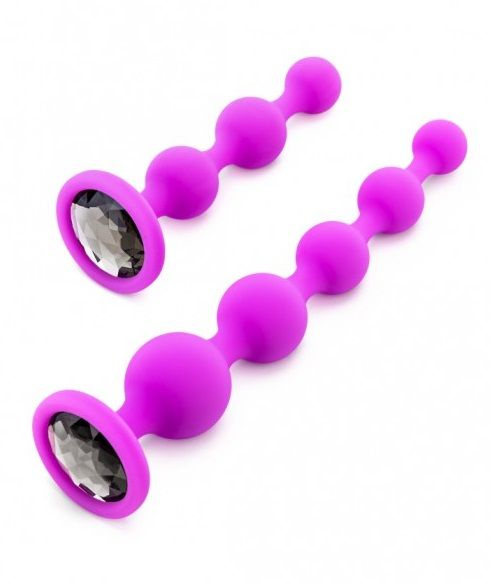 Набор из 2 лиловых анальных цепочек с кристаллами в основании купить в секс шопе