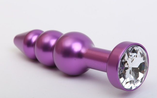Фиолетовая фигурная анальная ёлочка с прозрачным кристаллом - 11,2 см. купить в секс шопе