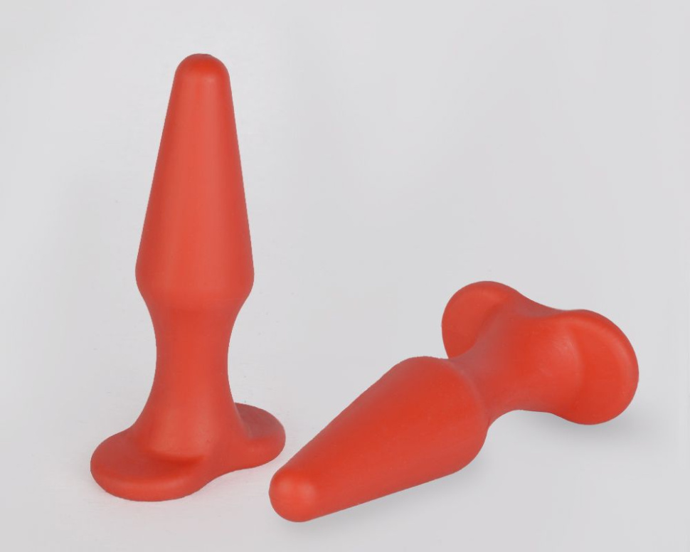 Красная коническая анальная пробка - 10,6 см. купить в секс шопе