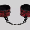 Красно-черные оковы Reversible Faux Leather Ankle Cuffs купить в секс шопе