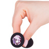 Чёрная анальная втулка с розовым кристаллом - 7,3 см. купить в секс шопе