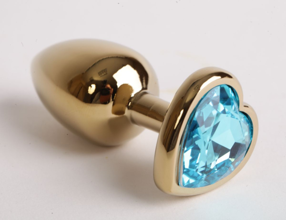 Золотистая анальная пробка среднего размера с голубым стразиком-сердечком - 8 см. купить в секс шопе