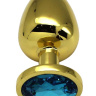 Золотистая анальная пробка с голубым кристаллом - 9 см. купить в секс шопе