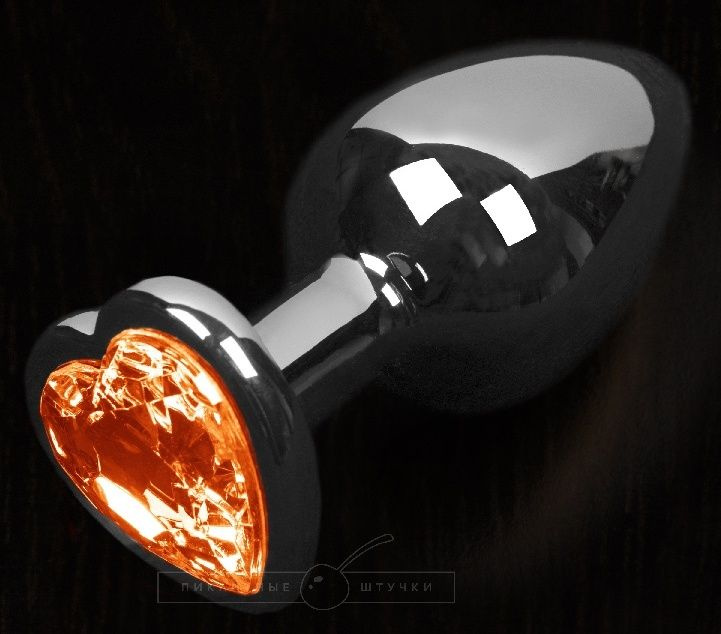 Серая анальная пробка с оранжевым кристаллом в виде сердечка - 8,5 см. купить в секс шопе