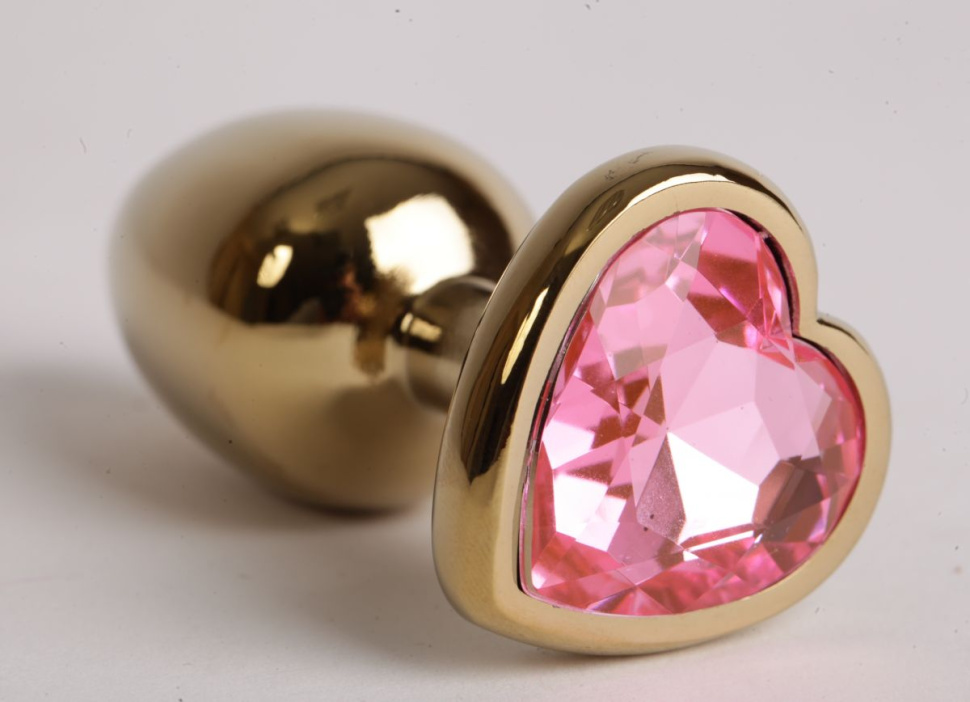 Золотистая анальная пробка с розовым стразиком-сердечком - 8 см. купить в секс шопе