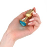Золотистая анальная пробка с голубым кристаллом в форме сердца - 7 см. купить в секс шопе