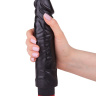 Реалистичный чёрный вибромассажер - 19,5 см. купить в секс шопе