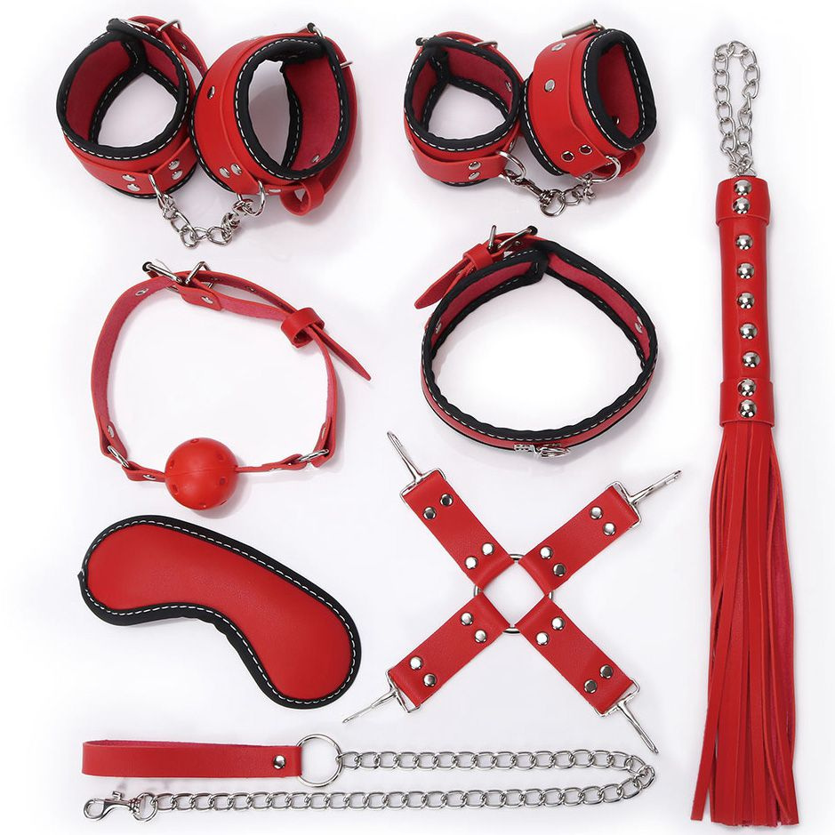 Пикантный красно-черный набор БДСМ: маска, ошейник, кляп, фиксатор, наручники, оковы, плеть купить в секс шопе
