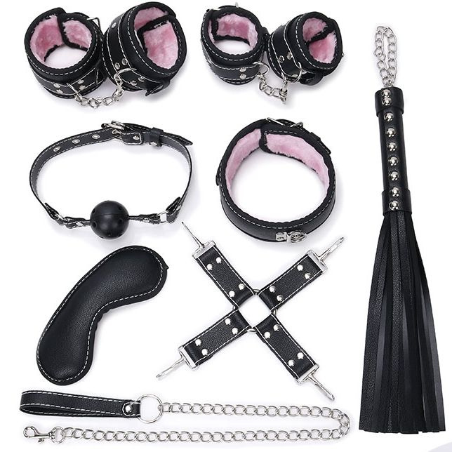 Пикантный черно-розовый набор БДСМ: маска, ошейник, кляп, фиксатор, наручники, оковы, плеть купить в секс шопе