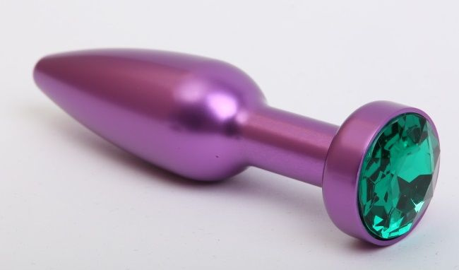 Фиолетовая анальная пробка с зелёным стразом - 11,2 см. купить в секс шопе