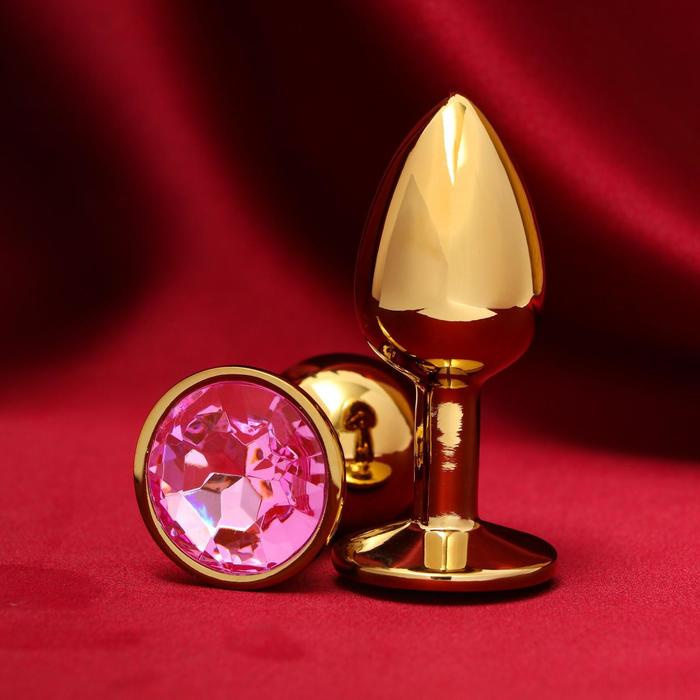 Золотистая анальная пробка с розовым кристаллом купить в секс шопе