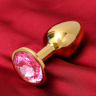 Золотистая анальная пробка с розовым кристаллом купить в секс шопе