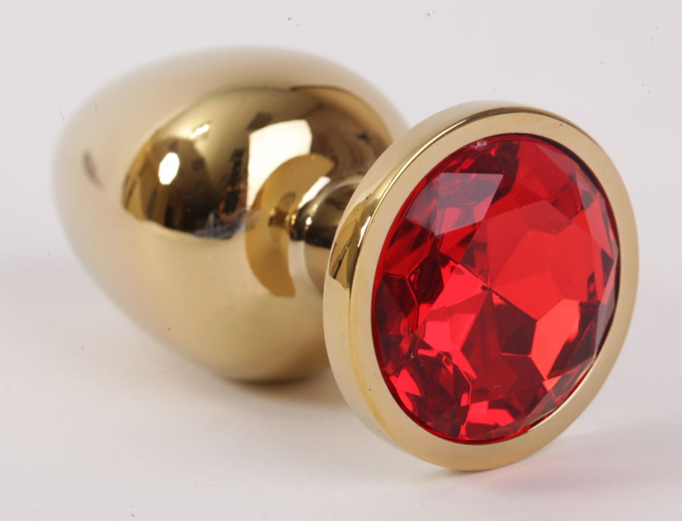Золотистая анальная пробка с красным кристаллом - 9,5 см. купить в секс шопе