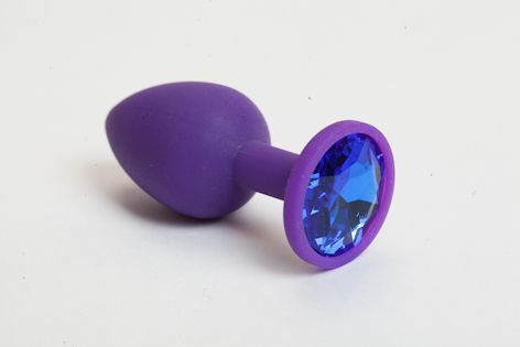 Фиолетовая анальная пробка с синим кристаллом - 8 см. купить в секс шопе