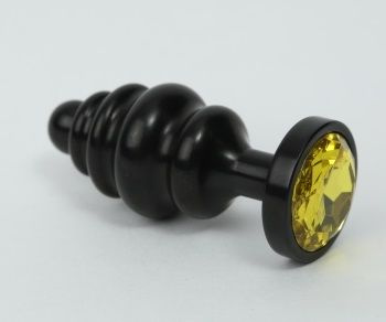 Чёрная ребристая анальная пробка с жёлтым кристаллом - 7,3 см. купить в секс шопе