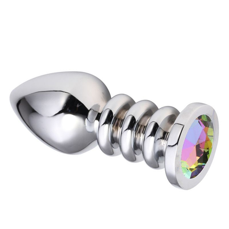 Серебристая анальная пробка на рельефной ножке с разноцветным кристаллом - 9 см. купить в секс шопе