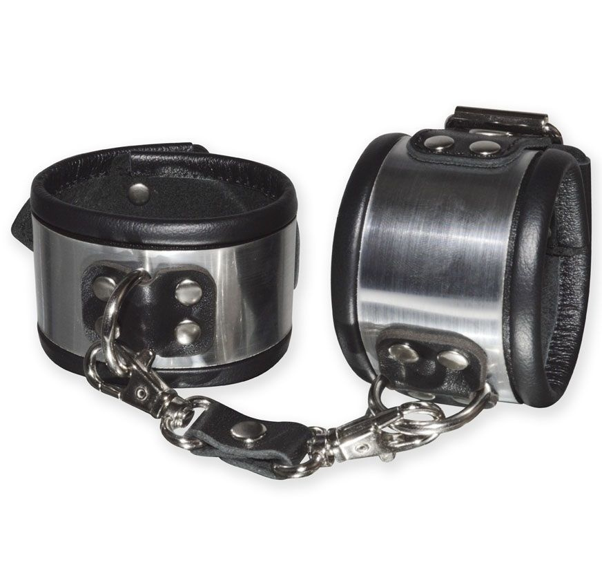 Эффектные серебристо-черные наручники с металлическим блеском купить в секс шопе