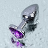 Серебристая коническая анальная пробка с фиолетовым кристаллом-сердечком - 7 см. купить в секс шопе
