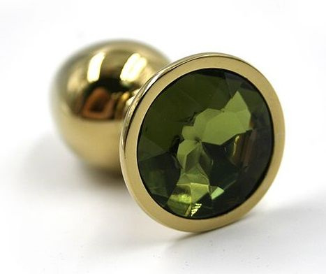 Золотистая алюминиевая анальная пробка с светло-зеленым кристаллом - 7 см. купить в секс шопе