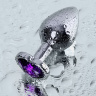 Серебристая коническая анальная пробка с фиолетовым кристаллом - 7 см. купить в секс шопе