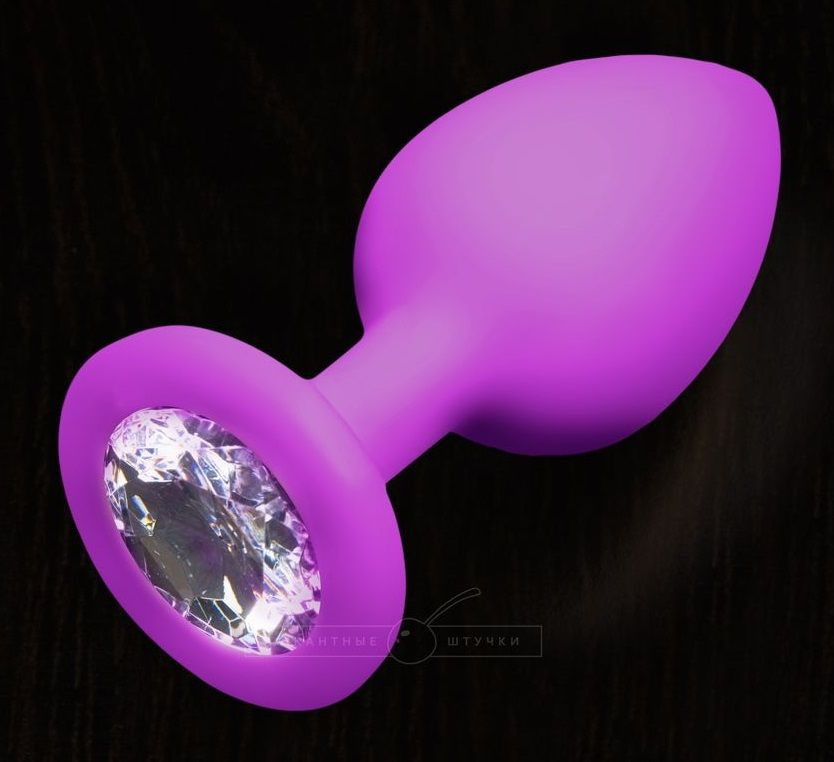 Фиолетовая силиконовая пробка с прозрачным кристаллом - 7,5 см. купить в секс шопе