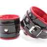 Лаковые чёрно-красные перфорированные наручники купить в секс шопе