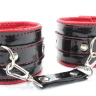 Лаковые чёрно-красные перфорированные наручники купить в секс шопе