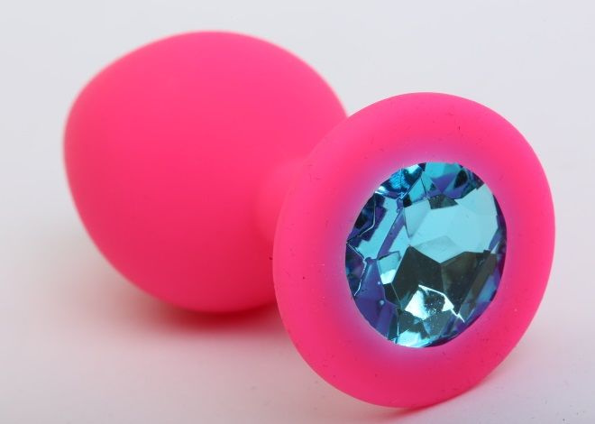 Розовая силиконовая анальная пробка с голубым стразом - 9,5 см. купить в секс шопе