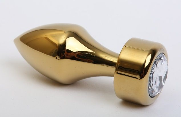 Золотистая анальная пробка с широким основанием и прозрачным кристаллом - 7,8 см. купить в секс шопе