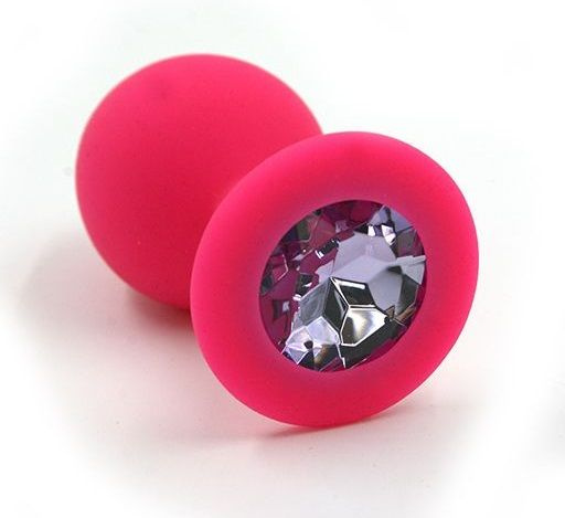 Розовая силиконовая анальная пробка с светло-фиолетовым кристаллом - 7 см. купить в секс шопе
