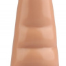 Телесная анальная втулка с шипиками - 21 см. купить в секс шопе