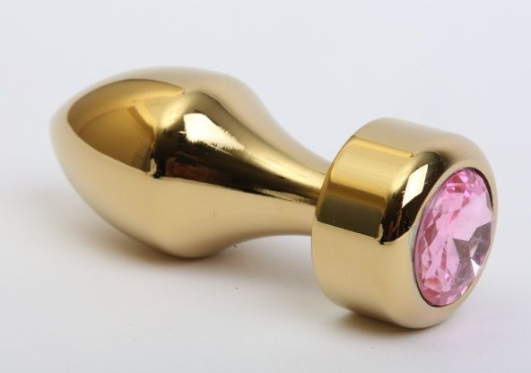 Золотистая анальная пробка с широким основанием и розовым кристаллом - 7,8 см. купить в секс шопе