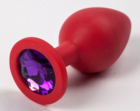 Красная силиконовая пробка с фиолетовым кристаллом - 9,5 см. купить в секс шопе