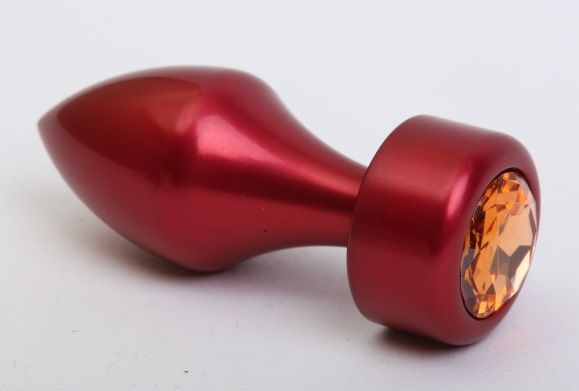 Красная анальная пробка с широким основанием и желтым кристаллом - 7,8 см. купить в секс шопе