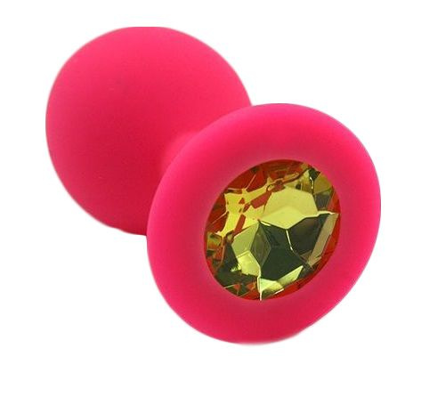 Розовая силиконовая анальная пробка с жёлтым кристаллом - 7 см. купить в секс шопе
