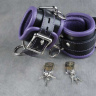 Подвёрнутые кожаные наручники с фиолетовым подкладом купить в секс шопе