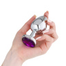 Серебристая металлическая анальная пробка с фиолетовым кристаллом - 9 см. купить в секс шопе