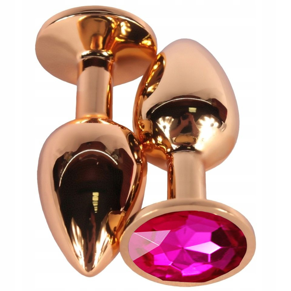 Золотистая анальная пробка с ярко-розовым кристаллом - 6,8 см. купить в секс шопе