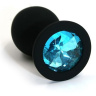Чёрная силиконовая анальная пробка с голубым кристаллом - 7 см. купить в секс шопе